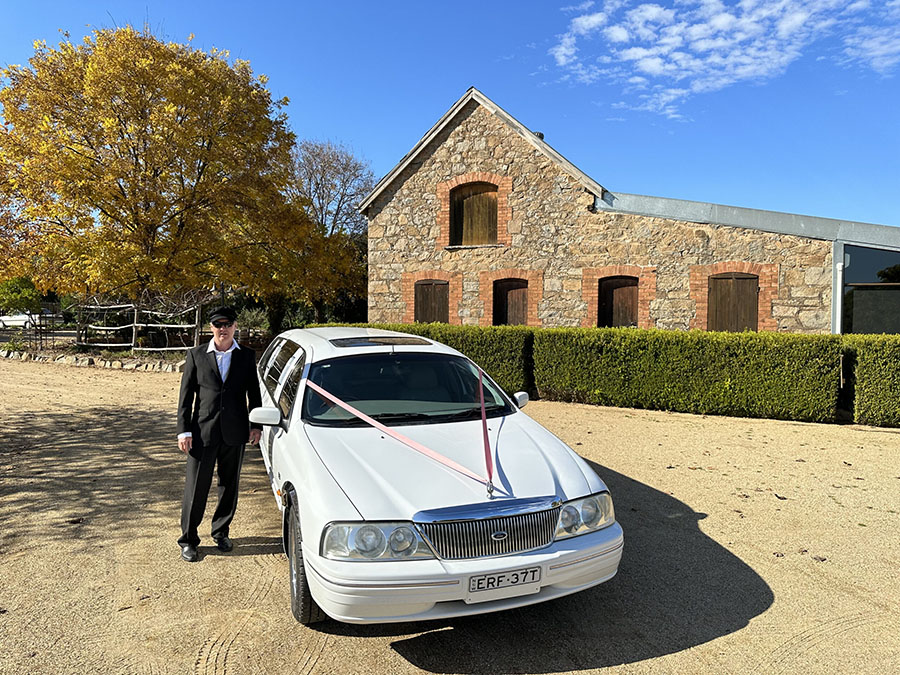 White limousine with driver